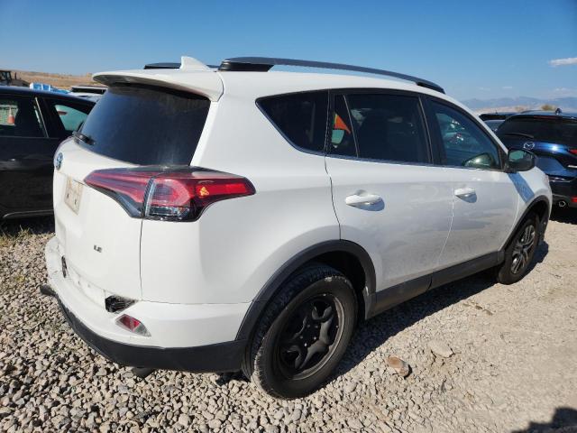 Photo 3 from auction – 2018 TOYOTA RAV4 LE with VIN 2T3ZFREV6JW479360
