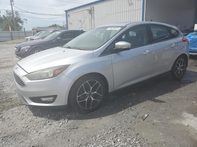 FORD FOCUS SEL 2017 with VIN 1FADP3M22HL312332 - Photo from auction