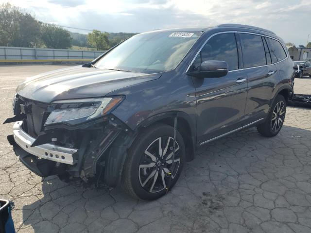 HONDA PILOT TOURING 2022 with VIN 5FNYF6H60NB043260 - Photo from auction