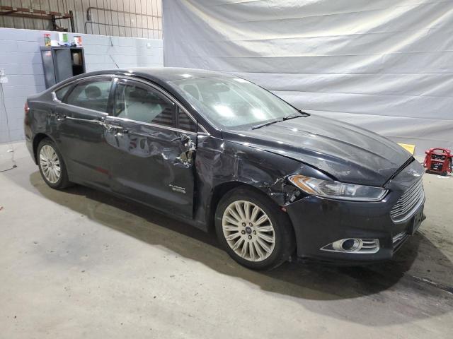 Photo 4 from auction – 2014 FORD FUSION SE PHEV with VIN 3FA6P0PU3ER189223