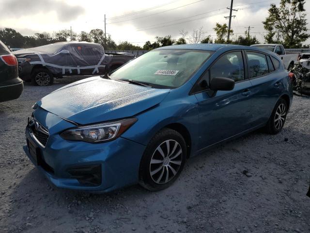 SUBARU IMPREZA 2017 with VIN 4S3GTAA63H3710194 - Photo from auction