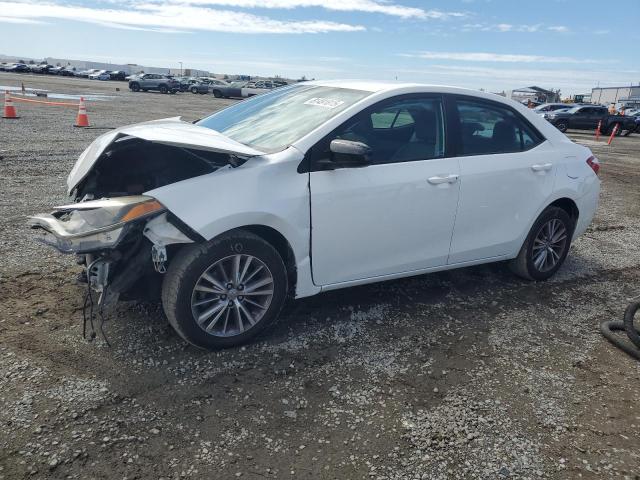 TOYOTA COROLLA L 2015 with VIN 5YFBURHE4FP211279 - Photo from auction