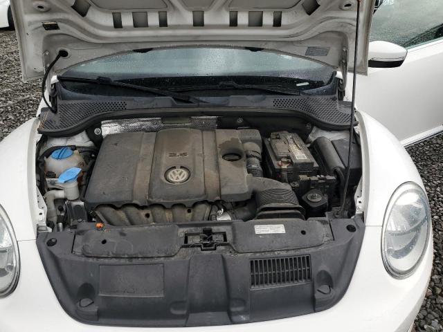 Photo 11 from auction – 2013 VOLKSWAGEN BEETLE with VIN 3VW5P7AT0DM826754