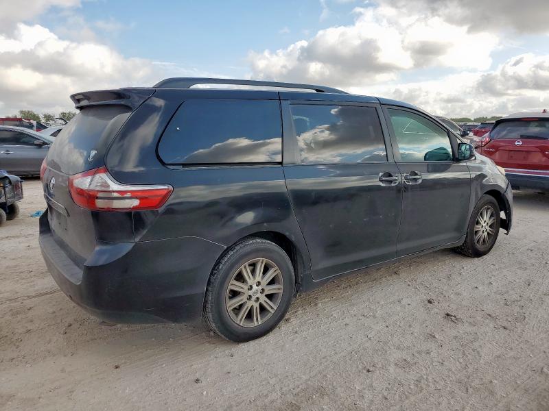 Photo 3 from auction – 2015 TOYOTA SIENNA LE with VIN 5TDKK3DC7FS665590