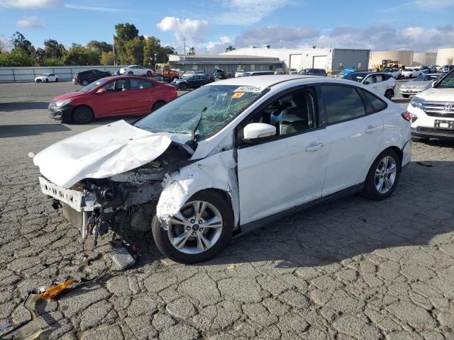 FORD FOCUS SE 2014 with VIN 1FADP3F24EL312051 - Photo from auction