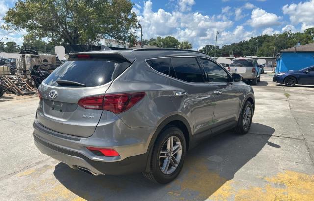 Photo 4 from auction – 2018 HYUNDAI SANTA FE S with VIN 5NMZU3LB1JH055701