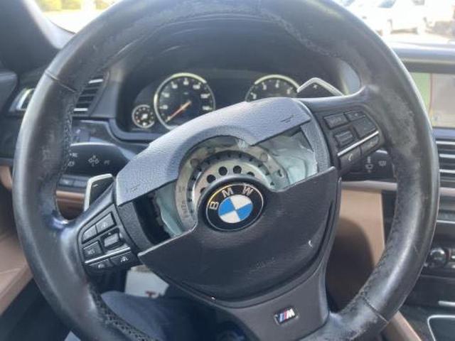 Photo 10 from auction – 2015 BMW 750 LXI with VIN WBAYF8C59FD654632