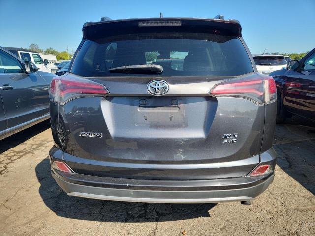 Photo 6 from auction – 2017 TOYOTA RAV4 XLE with VIN JTMRFREV9HD209322