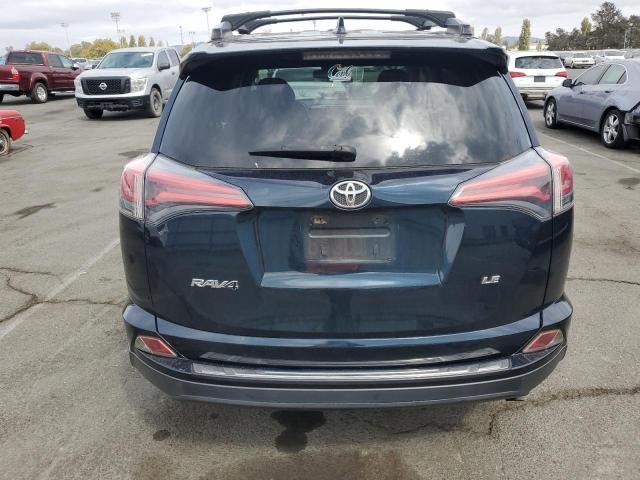 Photo 6 from auction – 2017 TOYOTA RAV4 LE with VIN JTMZFREV1HJ142376