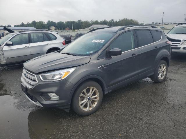 FORD ESCAPE SE 2018 with VIN 1FMCU9GD4JUC99528 - Photo from auction