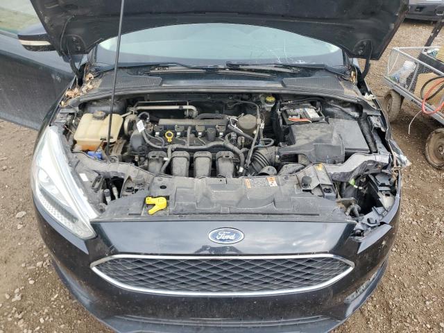 Photo 11 from auction – 2015 FORD FOCUS SE with VIN 1FADP3F25FL356254