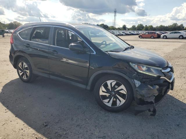 Photo 4 from auction – 2016 HONDA CR-V TOURI with VIN 5J6RM4H97GL089929