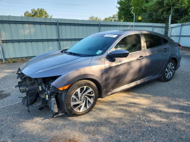 HONDA CIVIC EX 2018 with VIN 19XFC2F76JE013605 - Photo from auction