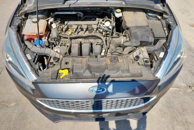 Photo 11 from auction – 2018 FORD FOCUS SE with VIN 1FADP3K20JL330630