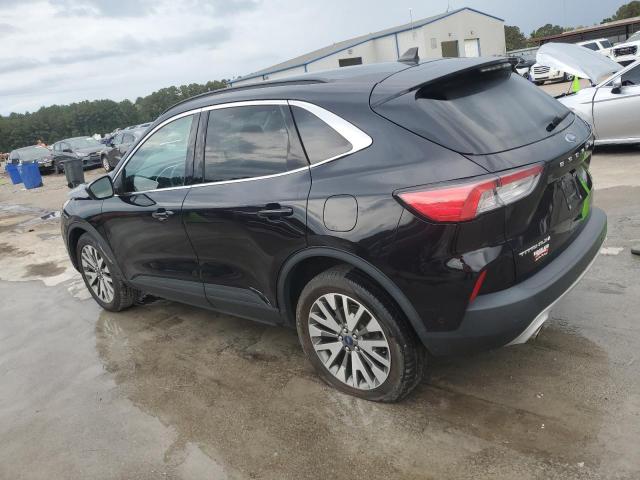 Photo 2 from auction – 2021 FORD ESCAPE TITANIUM with VIN 1FMCU9J97MUA71094