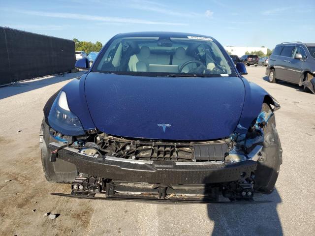 Photo 5 from auction – 2023 TESLA MODEL 3 with VIN 5YJ3E1EA9PF587302