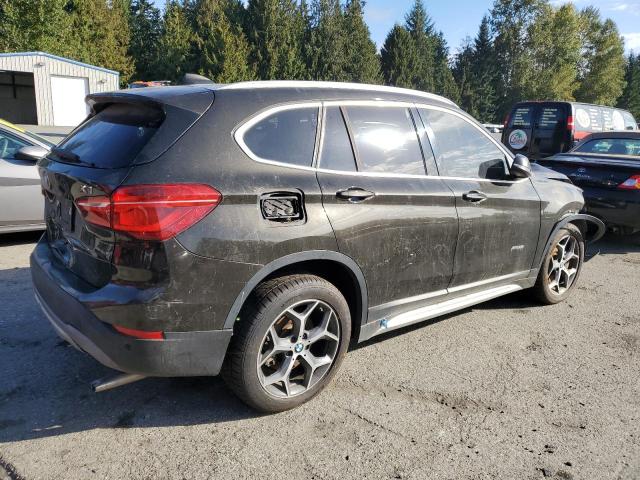 Photo 3 from auction – 2016 BMW X1 XDRIVE2 with VIN WBXHT3C35G5E48979