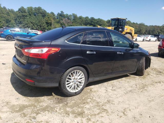 Photo 3 from auction – 2014 FORD FOCUS TITA with VIN 1FADP3J25EL201791