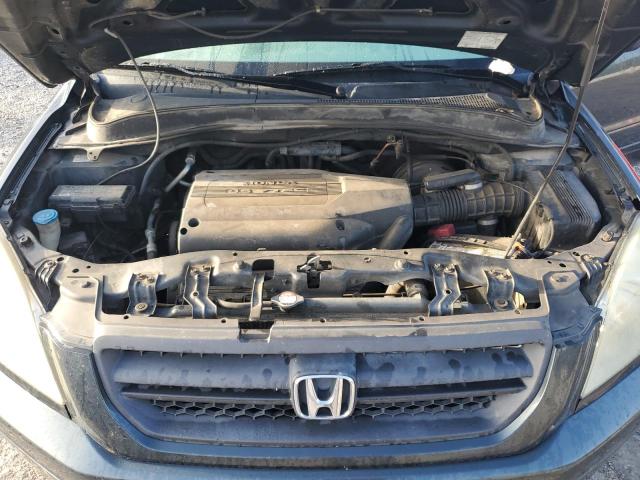 Photo 12 from auction – 2004 HONDA PILOT with VIN 2HKYF18544H603016