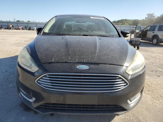 Photo 5 from auction – 2015 FORD FOCUS TITA with VIN 1FADP3J29FL268007