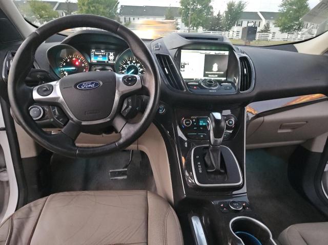 Photo 9 from auction – 2014 FORD ESCAPE TIT with VIN 1FMCU9J93EUB52059