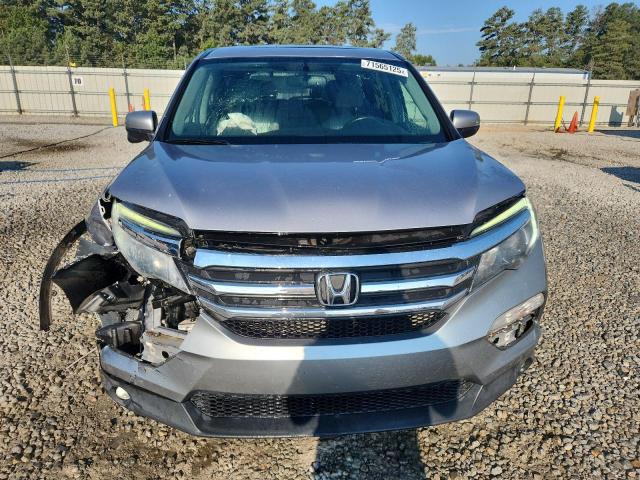 Photo 5 from auction – 2018 HONDA PILOT EXL with VIN 5FNYF5H86JB009992