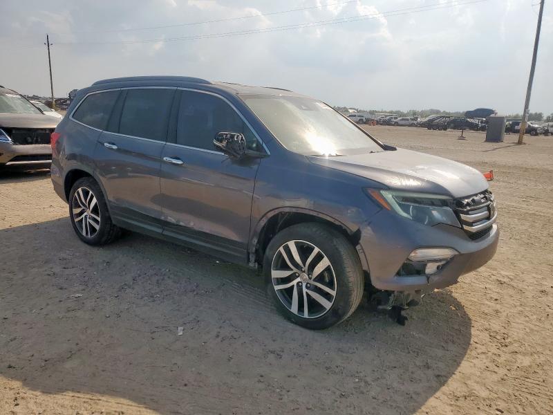 Photo 4 from auction – 2017 HONDA PILOT TOUR with VIN 5FNYF6H97HB007001