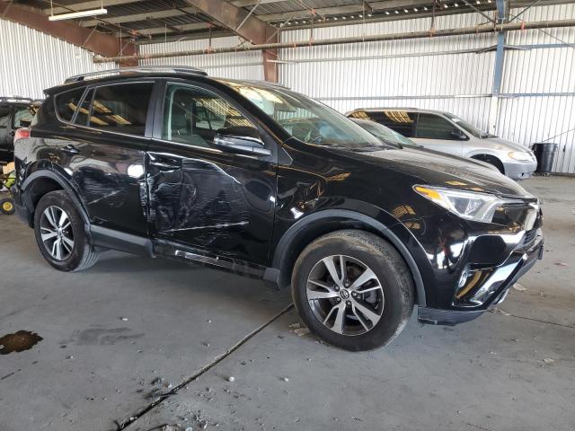 Photo 4 from auction – 2017 TOYOTA RAV4 XLE with VIN 2T3WFREV7HW362514