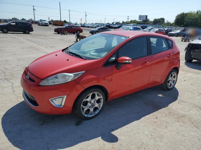 FORD FIESTA SES 2012 with VIN 3FADP4FJ8CM177097 - Photo from auction