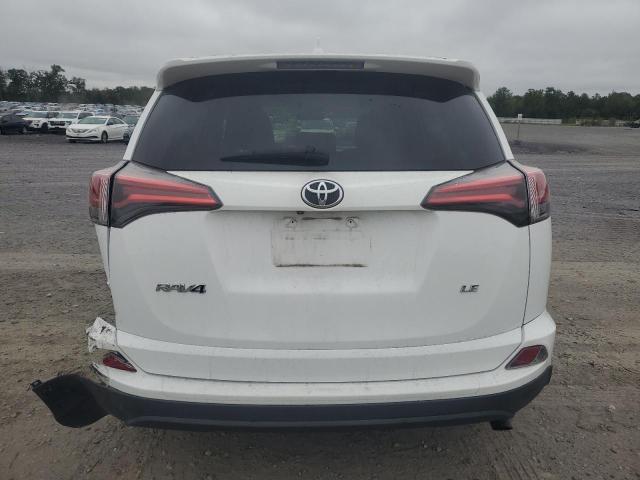 Photo 6 from auction – 2018 TOYOTA RAV4 LE with VIN 2T3ZFREV2JW472986