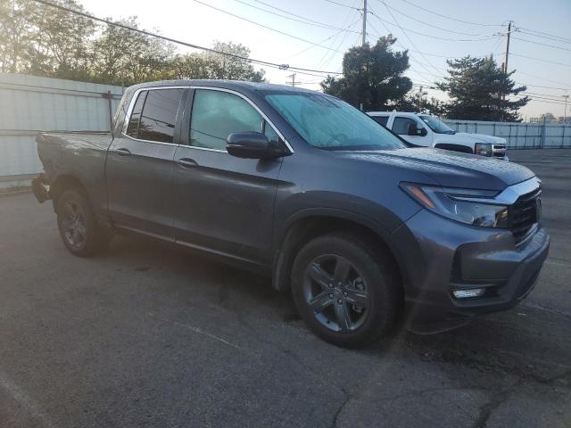 Photo 4 from auction – 2023 HONDA RIDGELINE with VIN 5FPYK3F58PB022543