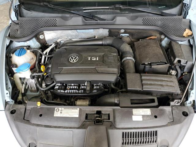 Photo 11 from auction – 2014 VOLKSWAGEN BEETLE with VIN 3VWJ07AT7EM634994