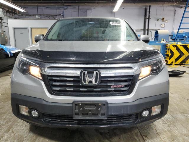 Photo 5 from auction – 2018 HONDA RIDGELINE with VIN 5FPYK3F19JB000717
