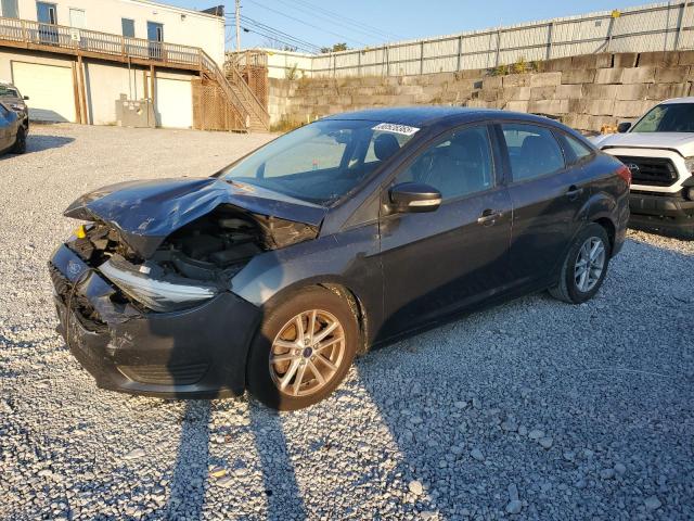 FORD FOCUS SE 2017 with VIN 1FADP3F24HL315701 - Photo from auction