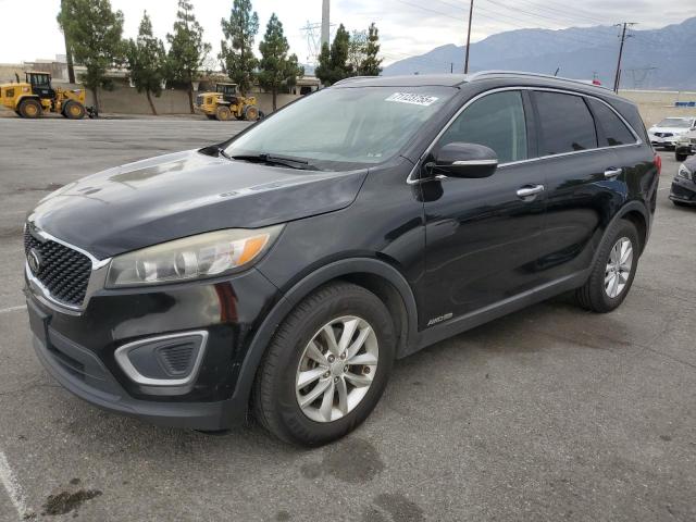KIA SORENTO LX 2016 with VIN 5XYPGDA52GG136579 - Photo from auction