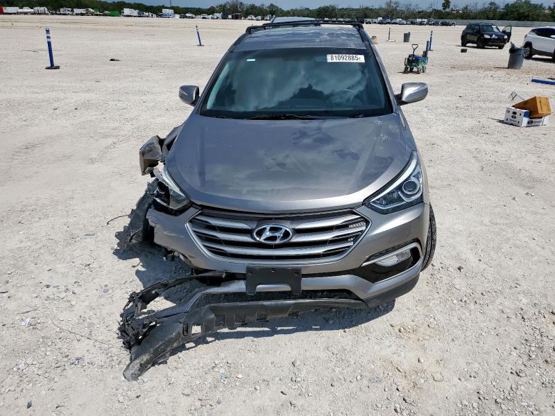 Photo 5 from auction – 2017 HYUNDAI SANTA FE S with VIN 5NMZU3LB0HH033537