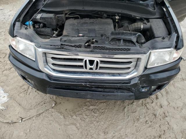 Photo 11 from auction – 2014 HONDA RIDGELINE with VIN 5FPYK1F54EB003764