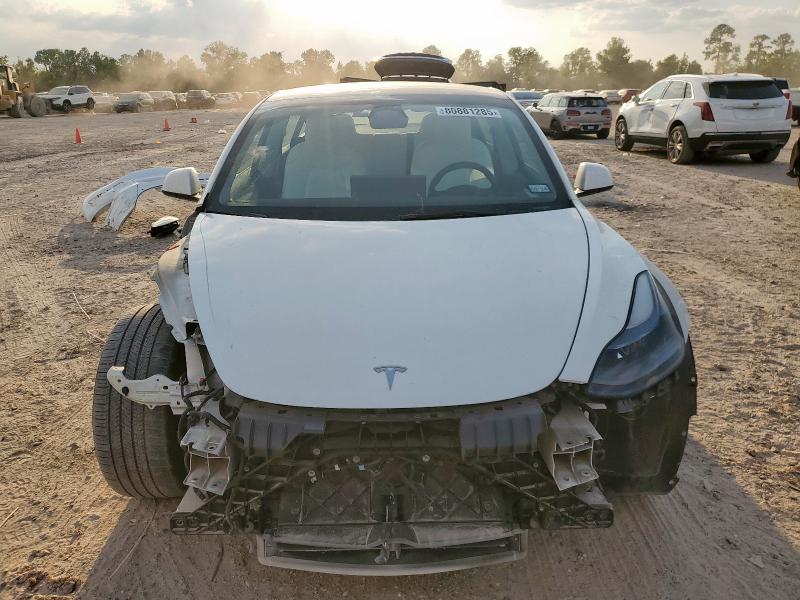 Photo 5 from auction – 2023 TESLA MODEL 3 with VIN 5YJ3E1EA8PF658036