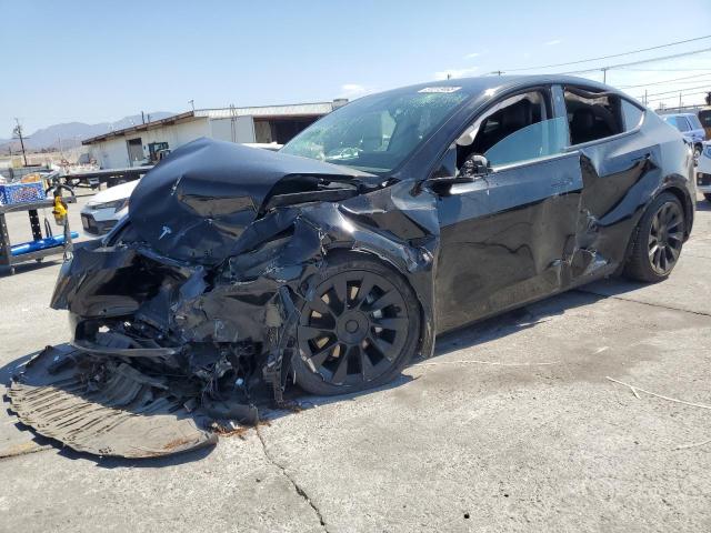 TESLA MODEL Y 2022 with VIN 7SAYGDEE7NF352529 - Photo from auction