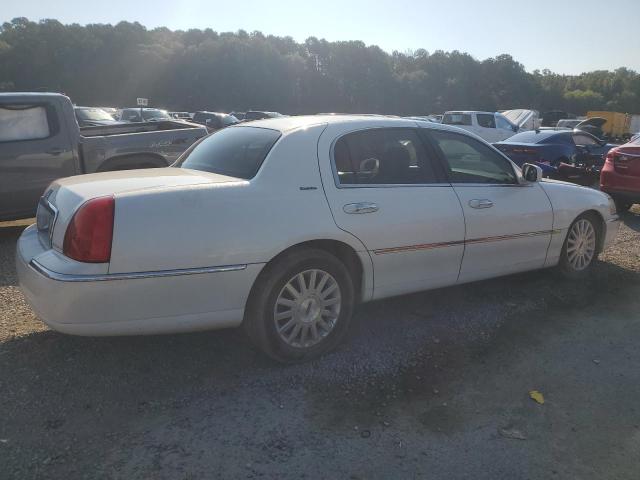 Photo 3 from auction – 2003 LINCOLN TOWN CAR E with VIN 1LNHM81W43Y649116