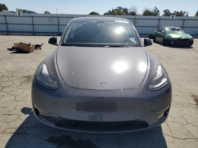 Photo 5 from auction – 2022 TESLA MODEL Y with VIN 7SAYGDEEXNF519143