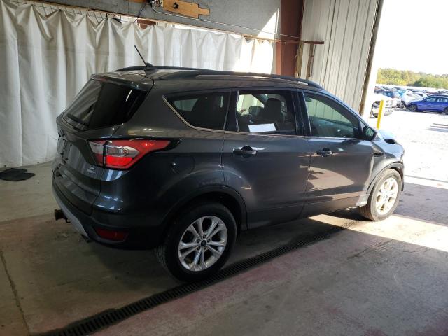 Photo 3 from auction – 2018 FORD ESCAPE SE with VIN 1FMCU9GD7JUB39028