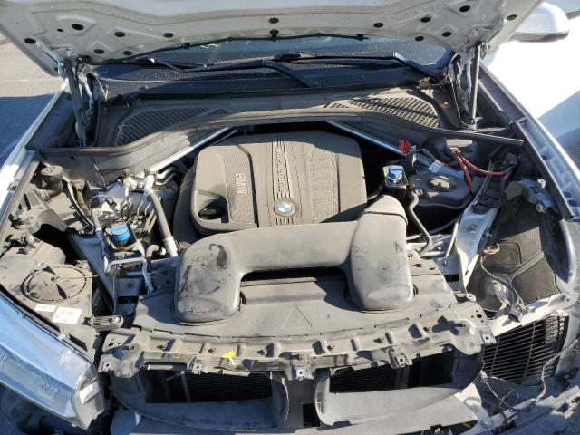Photo 11 from auction – 2015 BMW X5 XDRIVE3 with VIN 5UXKS4C52F0J98654