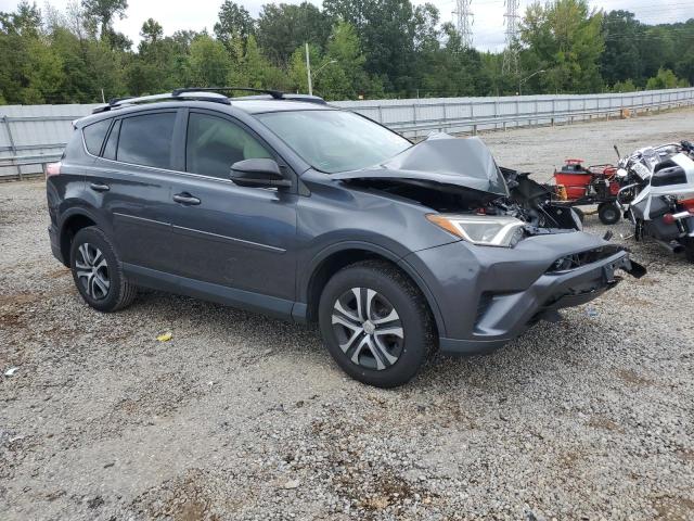 Photo 4 from auction – 2018 TOYOTA RAV4 LE with VIN JTMZFREV7JD130611