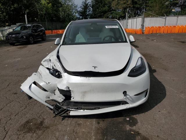 Photo 5 from auction – 2022 TESLA MODEL Y with VIN 7SAYGDEF0NF388524