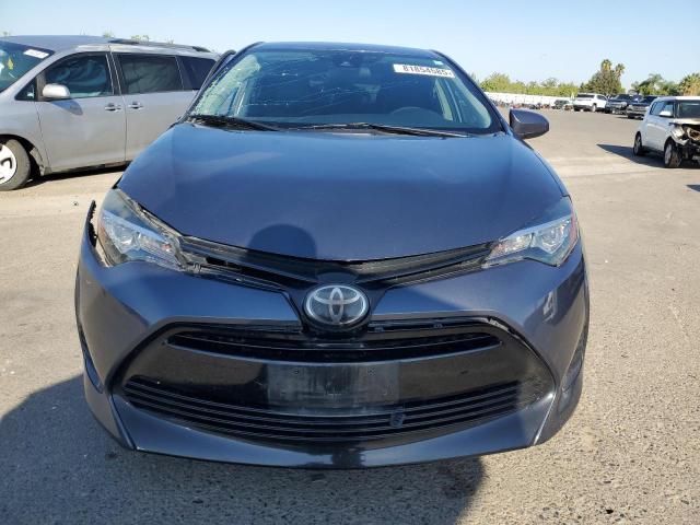 Photo 5 from auction – 2019 TOYOTA COROLLA L with VIN 5YFBURHE2KP936888