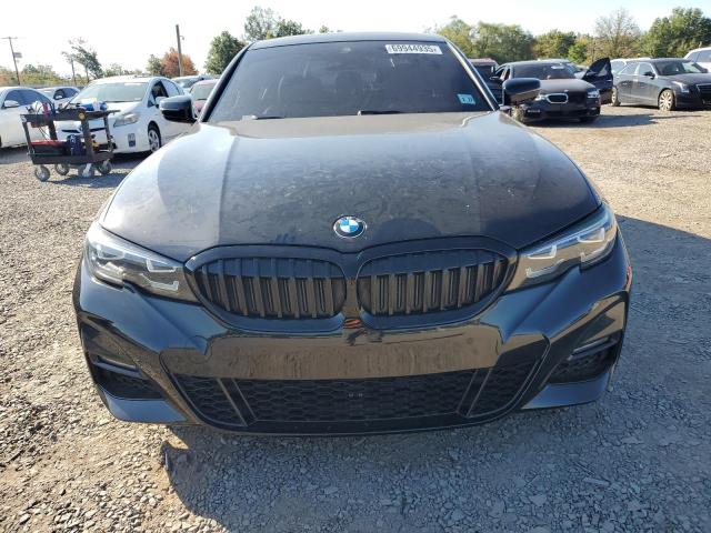 Photo 5 from auction – 2022 BMW 330XI with VIN 3MW5R7J08N8C49823