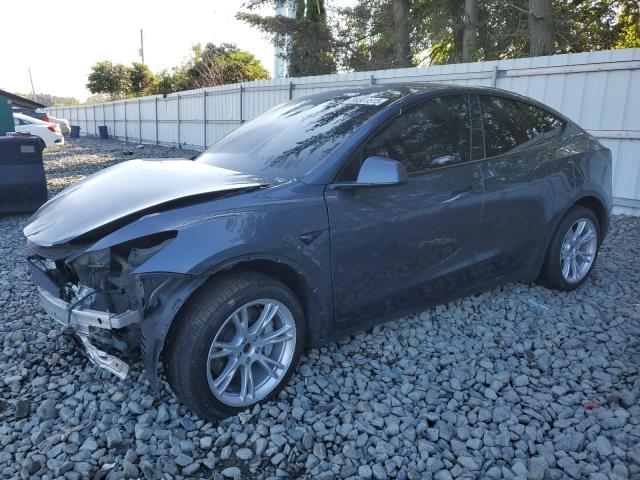 TESLA MODEL Y 2023 с VIN 7SAYGDEE2PA210900 - Фото с аукциона