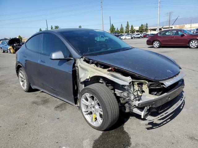 Photo 4 from auction – 2023 TESLA MODEL Y with VIN 7SAYGDED1PF963084