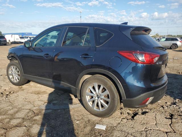 Photo 2 from auction – 2016 MAZDA CX-5 TOURI with VIN JM3KE2CYXG0700732